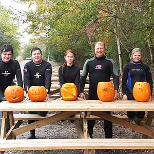 The contestants proudly display their masterful carvings
